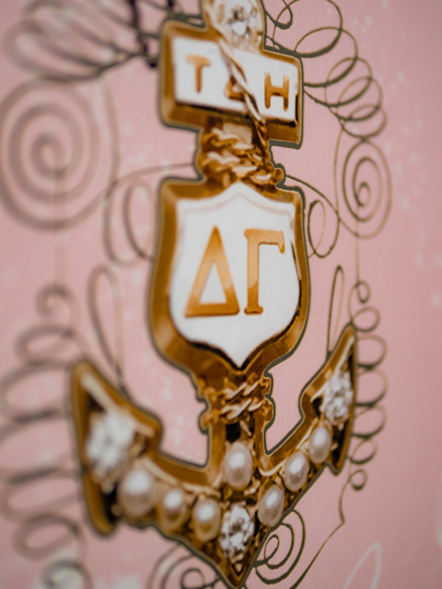A motif emblazoned on the wallpaper in the Delta Gamma House designed by Joni Vanderslice.