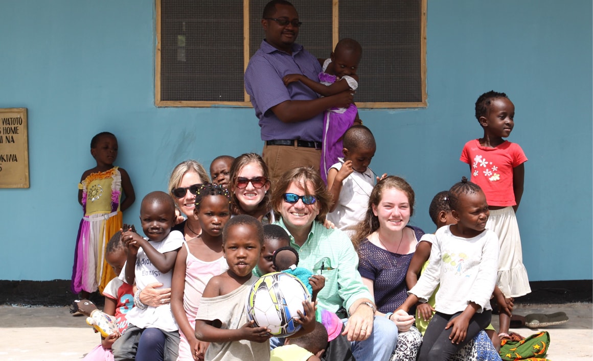 the vanderslice family with children at the valentine project in tanzania who now live at the children's home