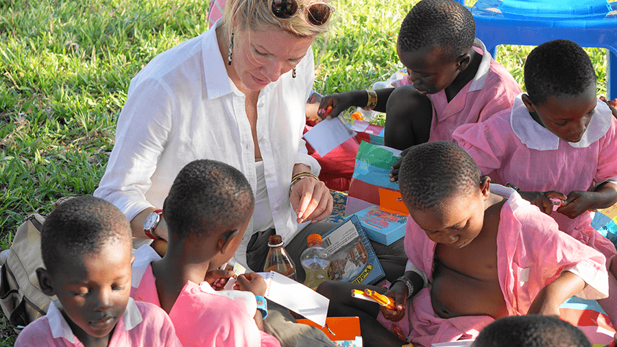 at the valentine project in dar es salam joni vanderslice plays with children under the care of the orphanage