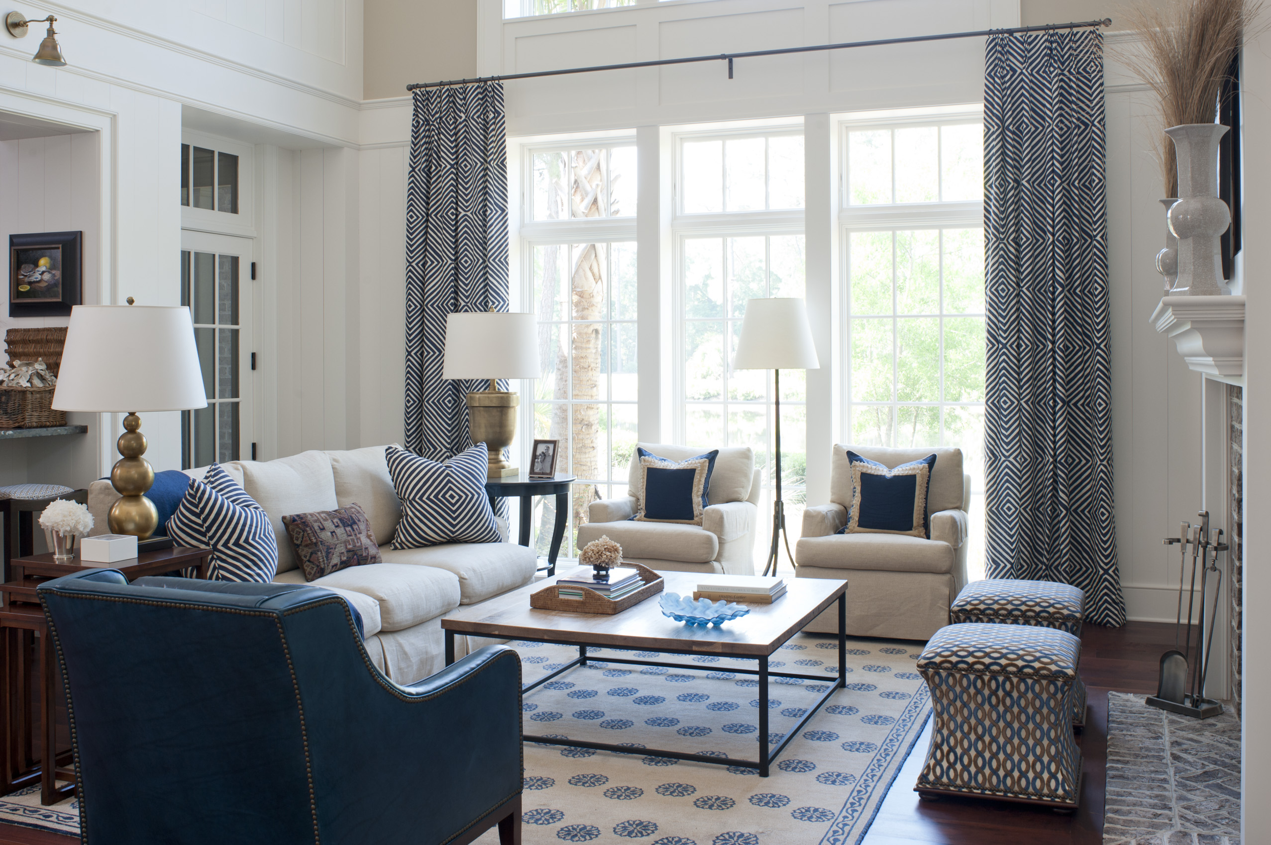 mixing textile patterns is a talent of the professionals at j banks design as is illustrated by this coastal-inspired living room