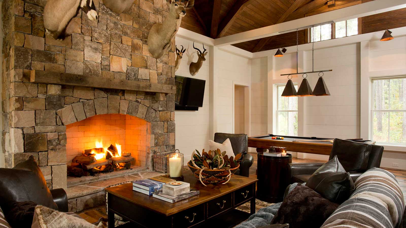 den fireplace designs by j banks design group create a cozy atmosphere that sacrifices nothing in style