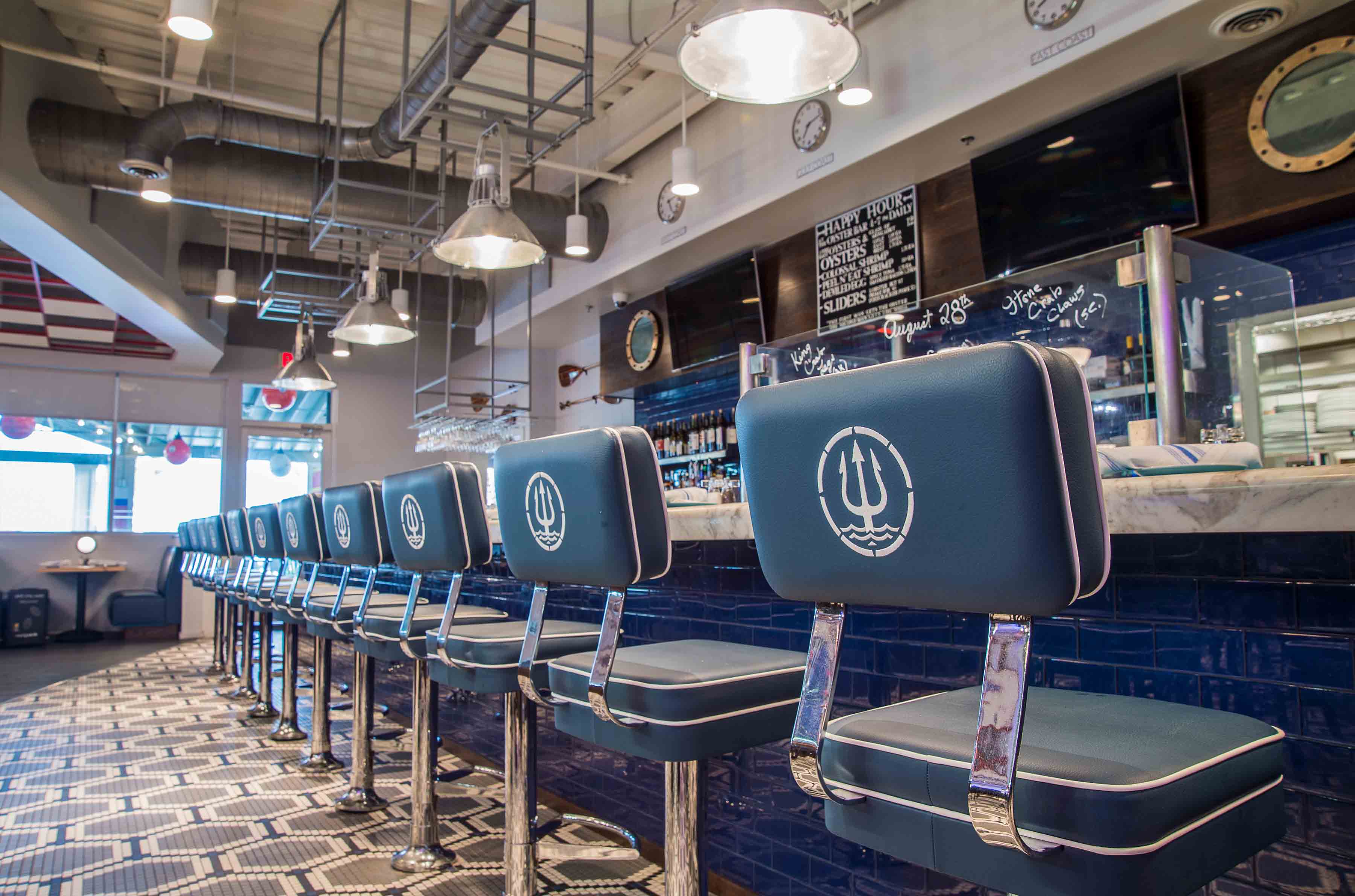 poseidon hilton head includes this nautical-inspired restaurant and bar area by j banks design group