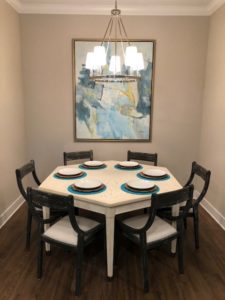 a coastal dining room designed by j banks design group in the WaterWalk at Shelter Cove Towne Centre