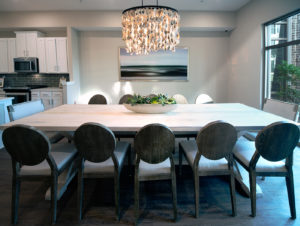 dining room in the penthouse living area at the WaterWalk at Shelter Cove by J. Banks Design