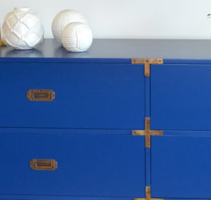 this blue dresser is a custom furniture designed by j banks design group in the Timbers Kiawah Ocean Club & Residences