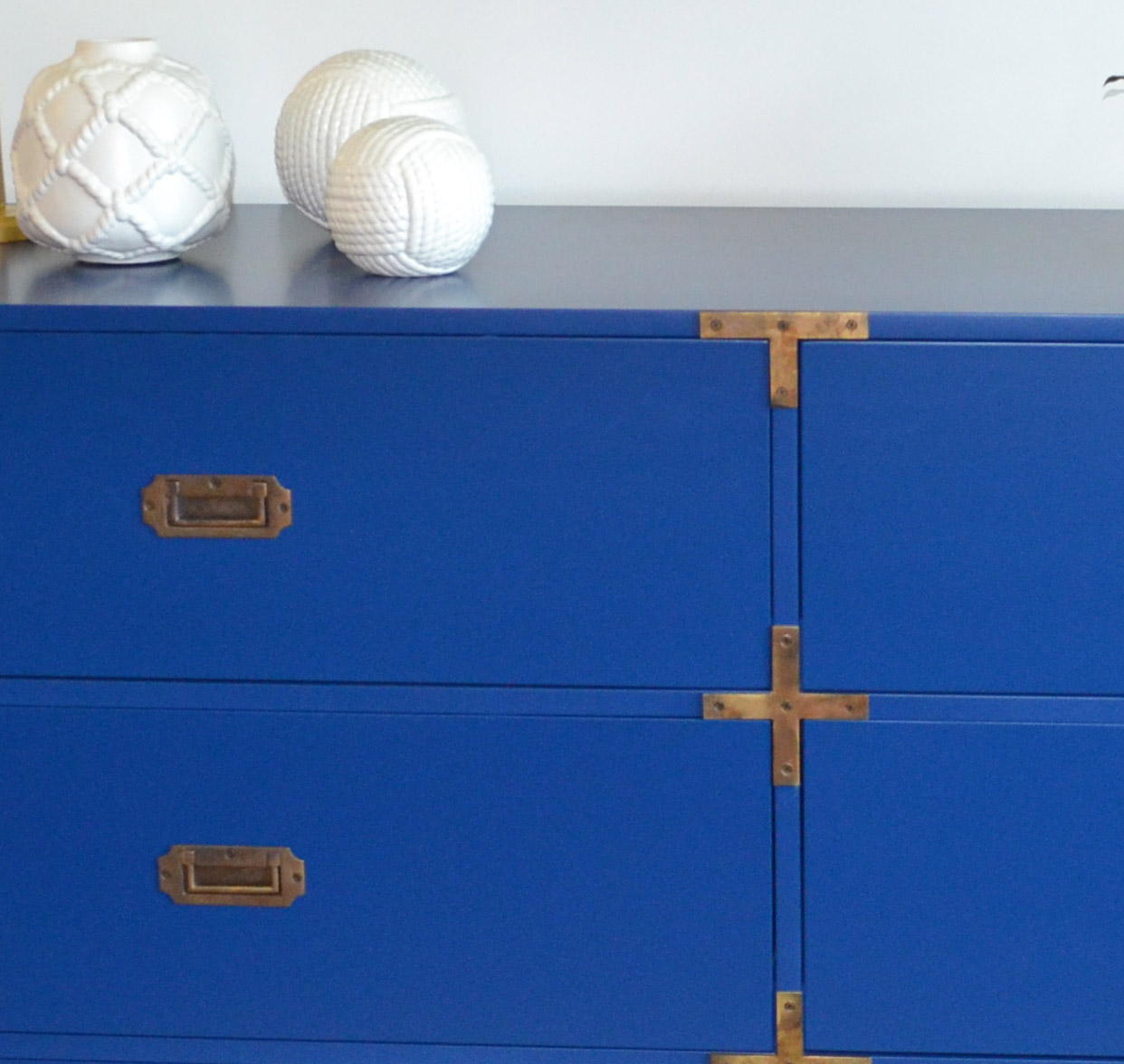 this blue dresser is a custom furniture designed by j banks design group in the Timbers Kiawah Ocean Club & Residences