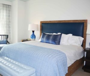 seaside-inspired bed linens sourced and placed by designers at j banks design group at the Timbers Kiawah Ocean Club & Residences