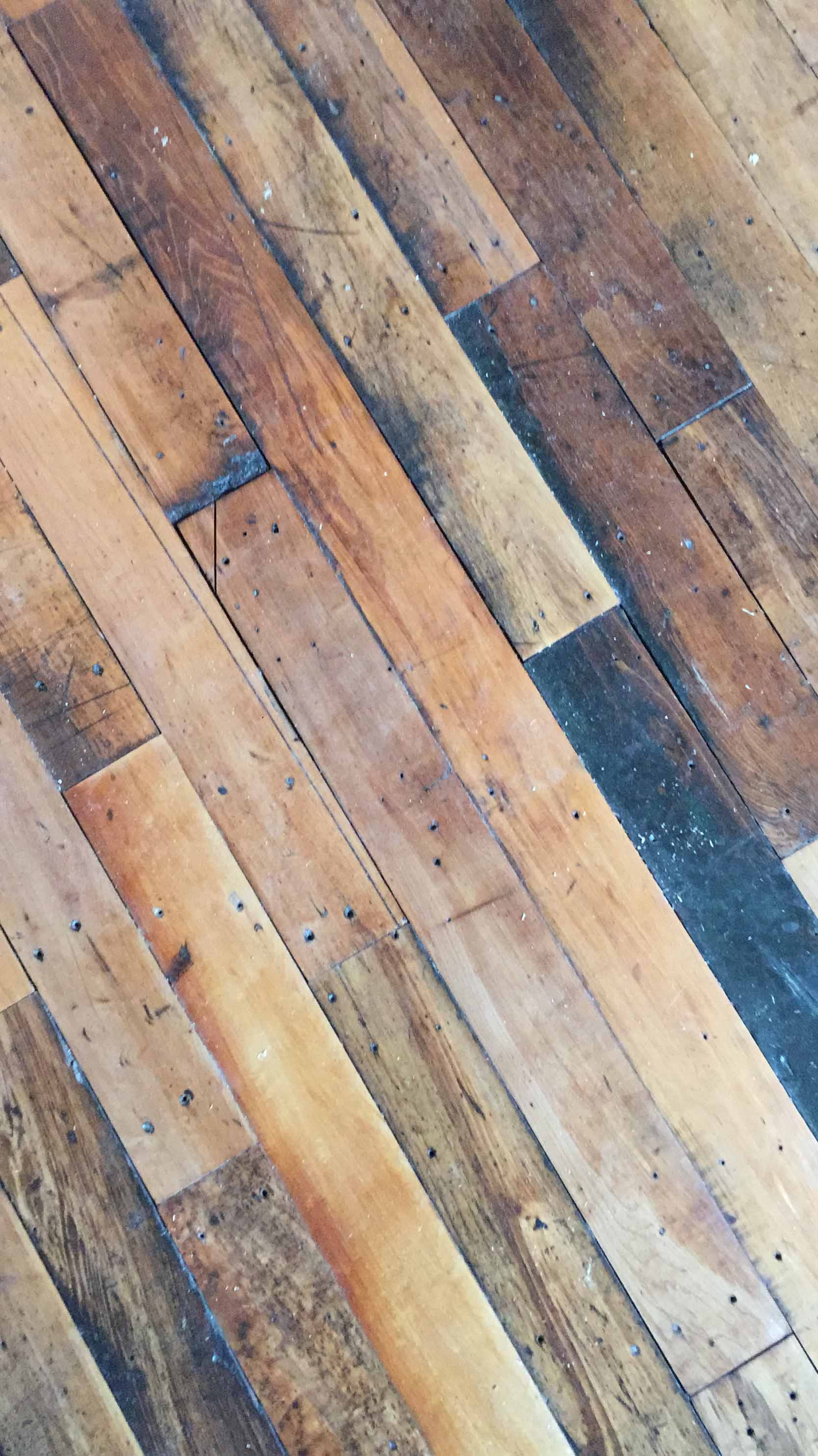 interior design reclaimed wood used for the floors of the Ohoopee Match Club with interiors by j banks design