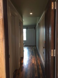 reclaimed maple floors interior in the interior of the Ohoopee Match Club resort by j banks design group