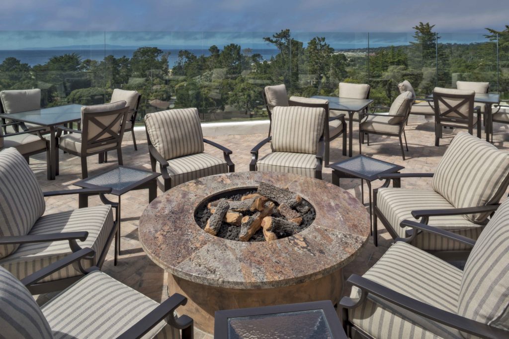 seaside outdoor granite firepit at monterey peninsula country club sourced by j banks design group