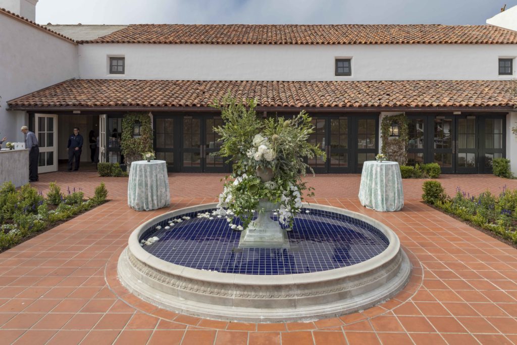spanish mediterranean courtyard fountain at monterey peninsula country club by j banks design group
