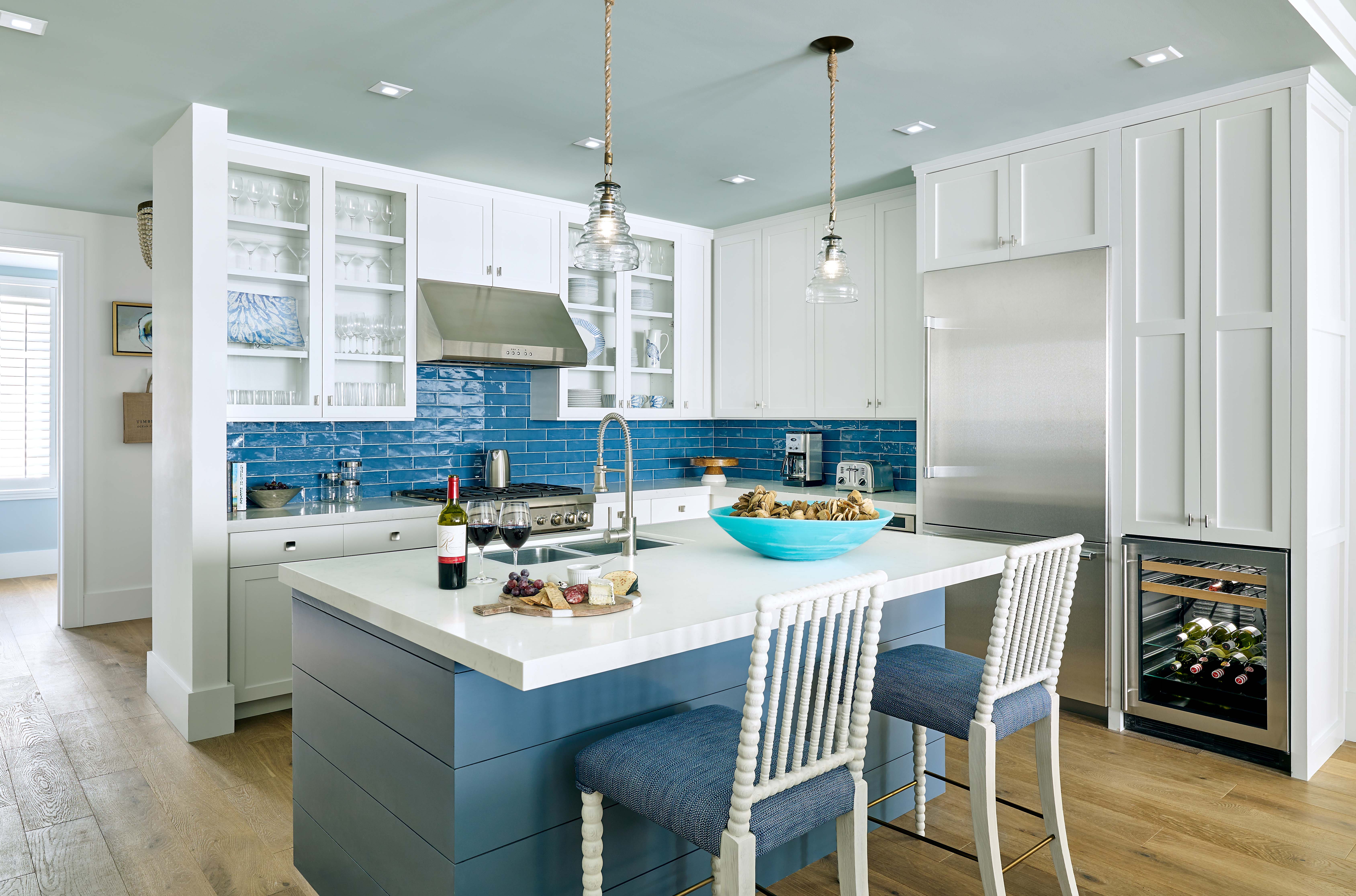 blues and crisp whites dominate a kitchen at the timbers in kiawah island designed by the J. Banks Design Group