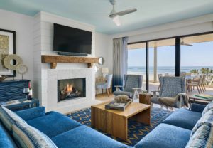 vibrant blues dominate in this oceanfront living room at the timbers in kiawah island designed by the J. Banks Design Group