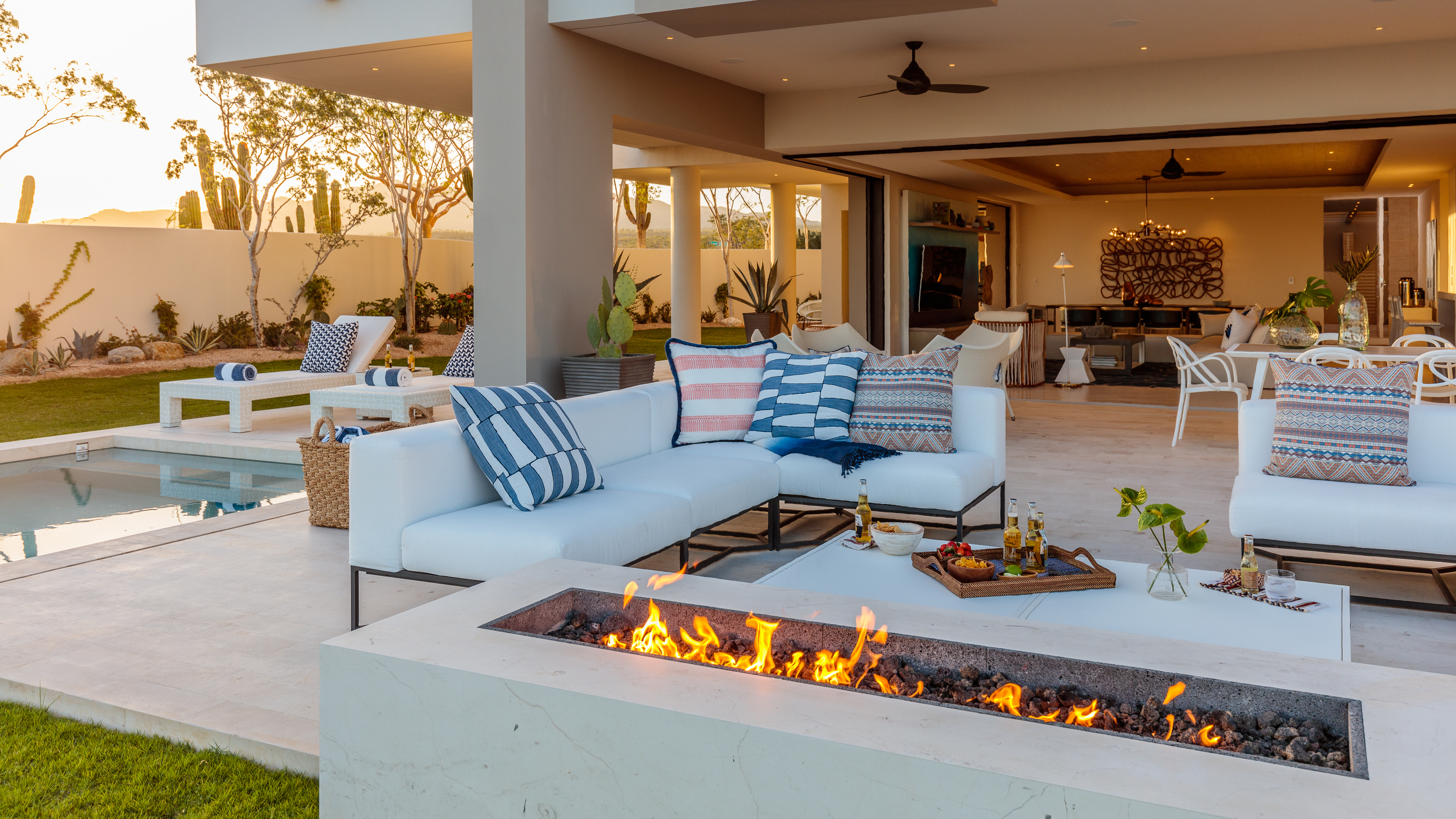 J Banks Design Group envisioned this Maravilla Los Cabos Outdoor Living space with a Fire Pit