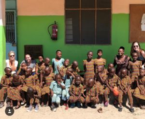 Joni, Grace and Sarah Vanderslice with children from the valentine project children's home in dar es salaam tanzania