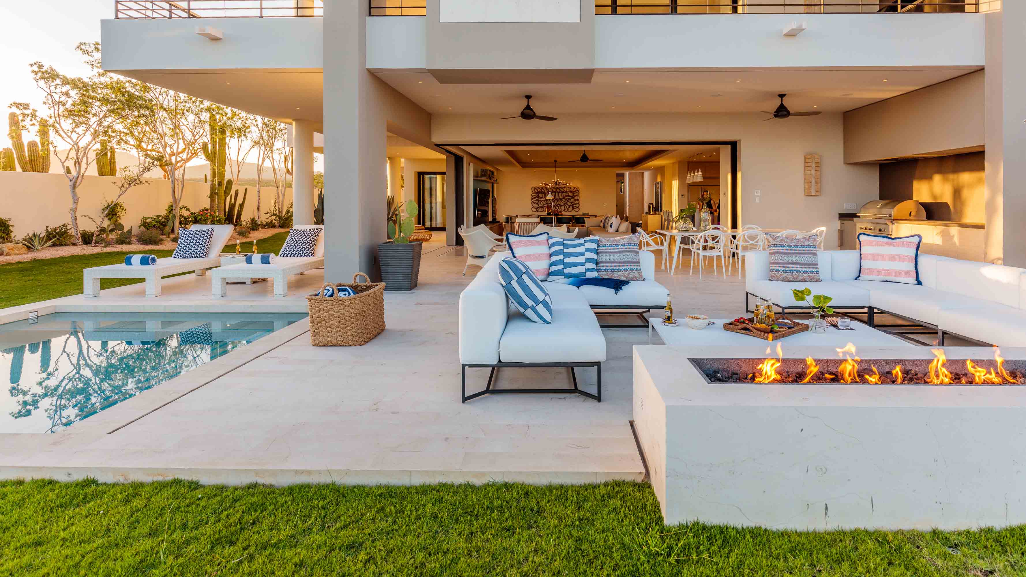 J Banks Design Group envisioned this Maravilla Los Cabos Maxico Outdoor Living space with a Fire Pit