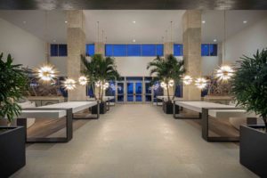 light fixtures effervesce in this view of the lobby of the Embassy Suites in St. Augustine designed by the J. Banks Design Group