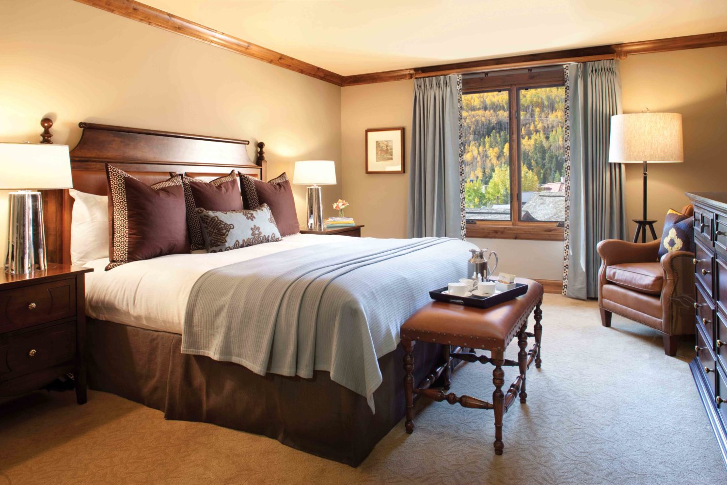 J Banks Design Group bedroom in a mountain retreat with a casual chic comfort