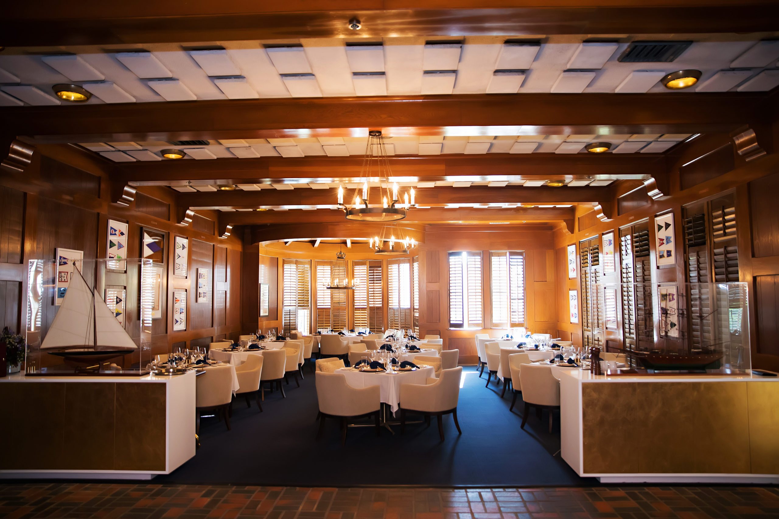 Tampa Yacht & Country Club's Pilot House dining room has been newly renovated and designed by Janet Perry and Laura Bischofsberger of J. Banks Design Group.