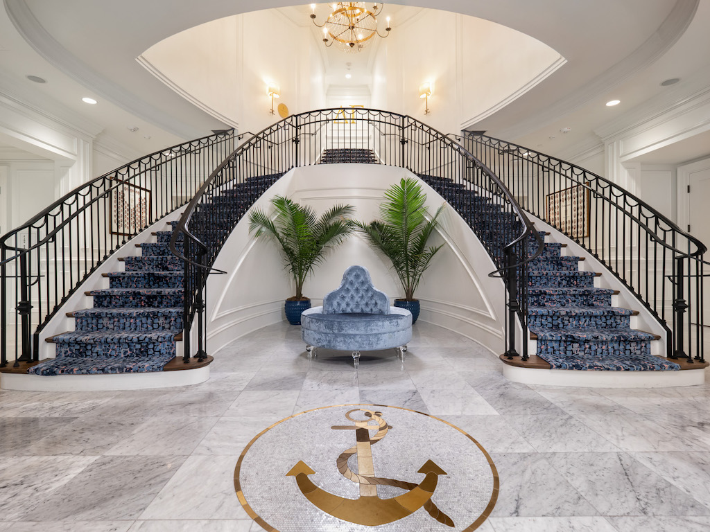 The entry hall of Delta Gamma, the sorority house design by J. Banks.